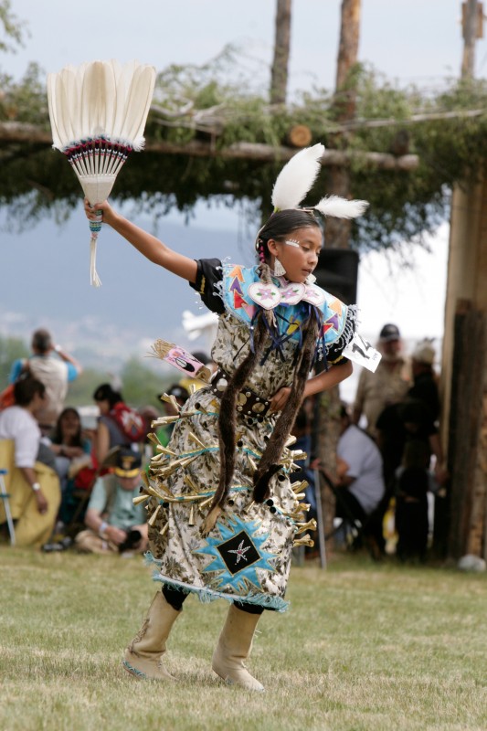 Young girl adorned in her traditional outfit