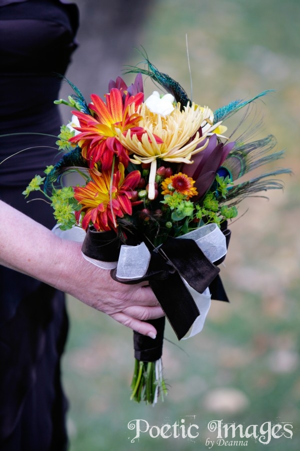 wedding flowers with orange, yellow, peacock wedding flowers with orange, yellow, peacock