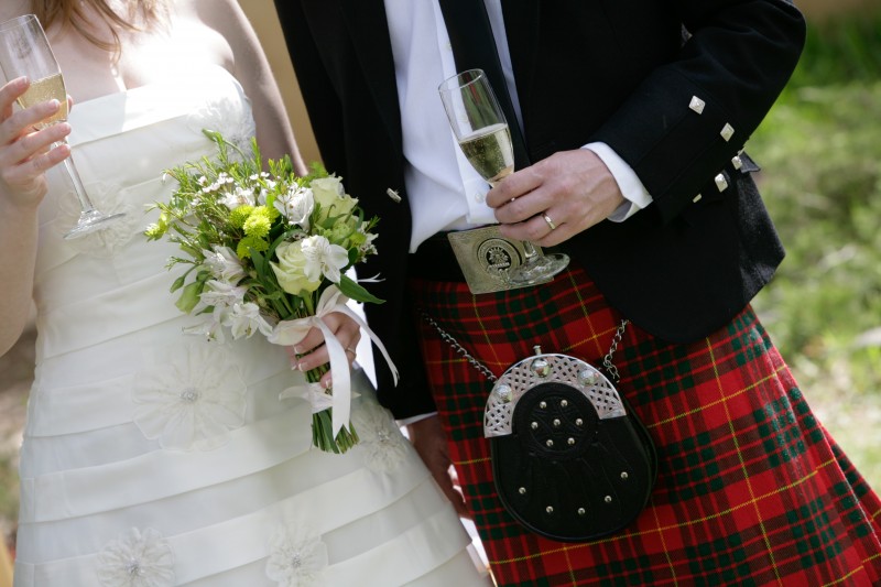 Bouquet, champagne, wedding dress, and Kilt