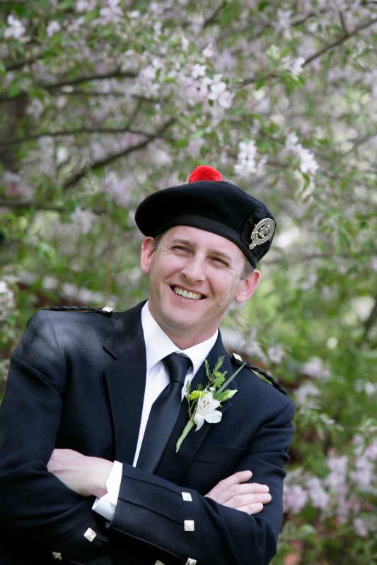 Groom and flowering lilacs