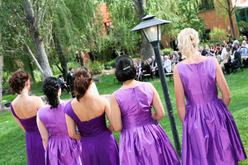 purple bridesmaid dresses and flowers