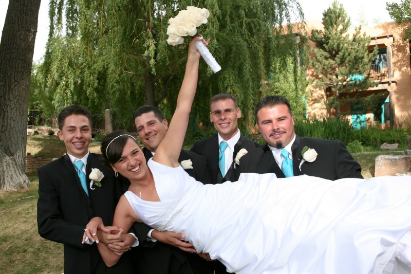 bride and gown and groomsmen