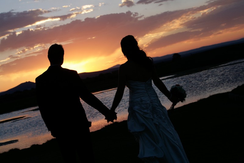 Sunset silhouettes on wedding day