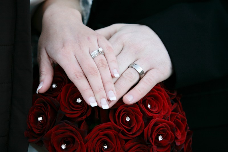 flowers and wedding rings