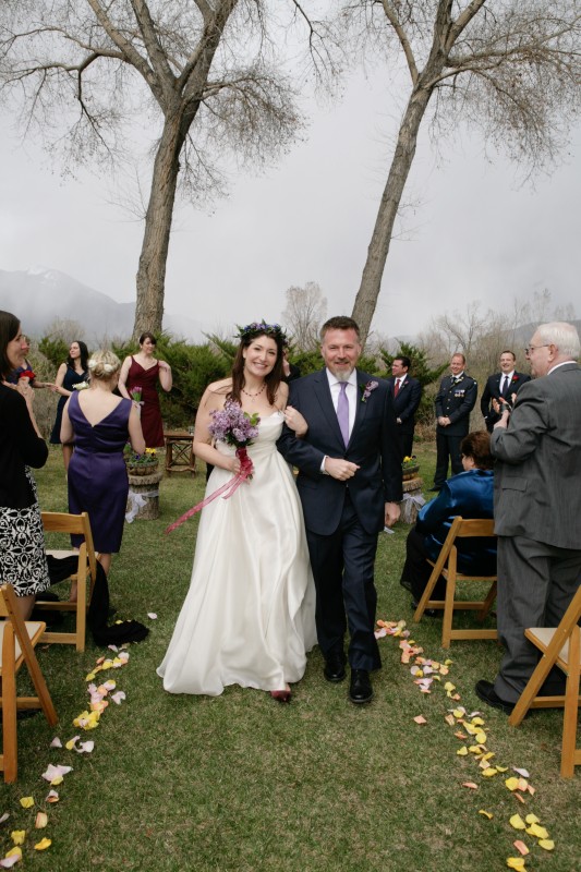 Bride and Groom Walking Down Aisle
