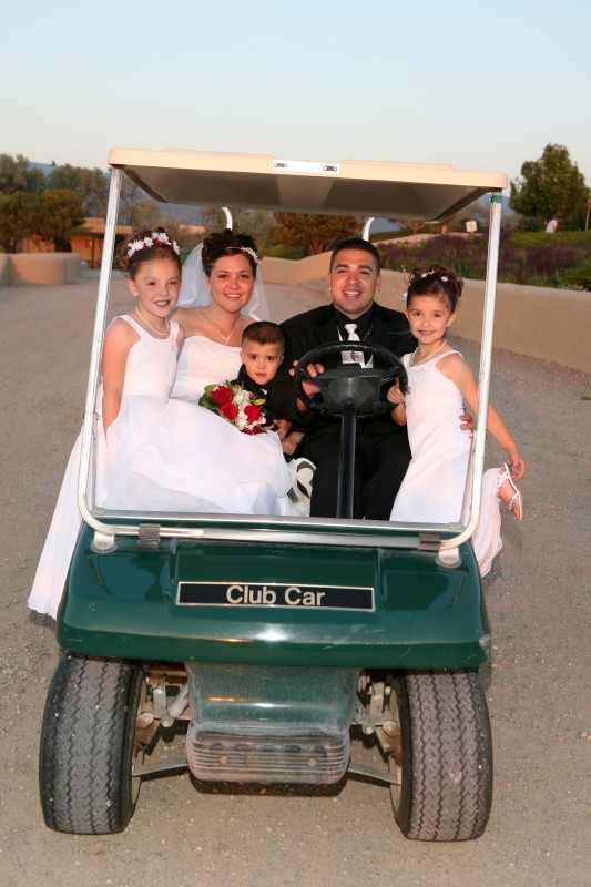 wedding family cruising on golf course