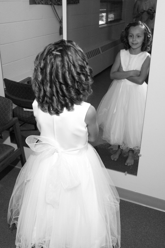 flower girl admiring beauty