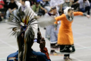 photographer capturing powwow in nm