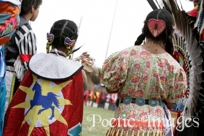 Native Americans kids in traditional regalia