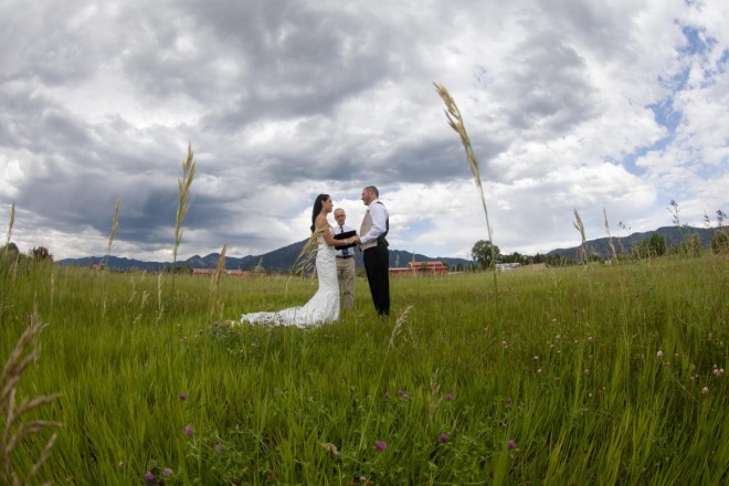 Beautiful view of green grass and heavy clouds on warm July wedding night