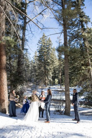 Under the guise of a blue sky, these newlyweds were married at 28 degrees in December
