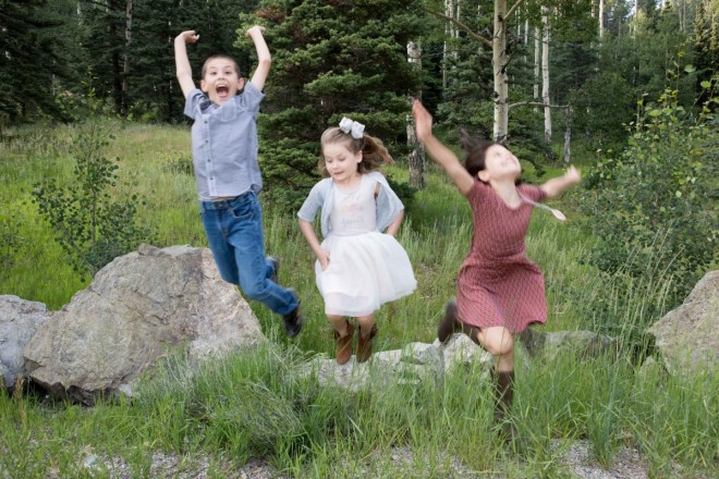 Children being silly during their family photo shoot.