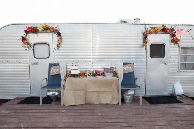 Wedding Cake and Champagne and Mr. and Mrs. Decorations on Trailer Patio