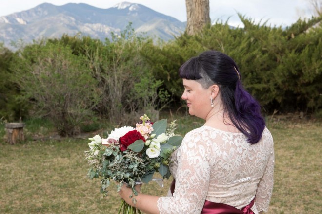 April with purple hair and a gorgeous bouquet by Enchanted Florist