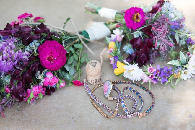 Garden flower bouquets and hippy jewelry and the cork of the local New Mexico champagne
