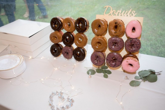 A wedding donut bar adorns this unique Taos wedding reception