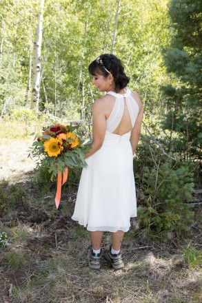 A sleeveless wedding dress was perfect for our warm September in Taos this fall
