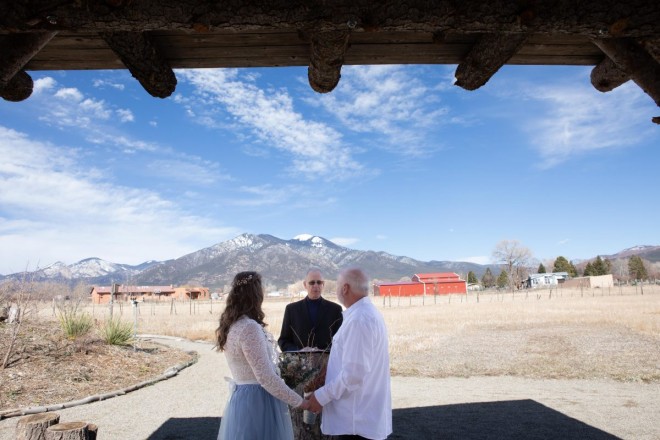Outdoor wedding in El Prado with scenic views of sacred Taos Mountain