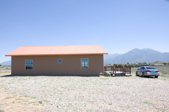 Two bedroom stucco home for rent in Taos NM near Blueberry Hill