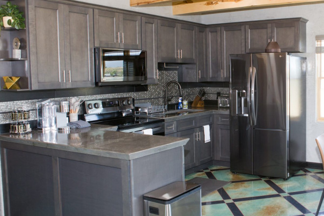 Modern kitchen with stainless steel appliances at Taos rental