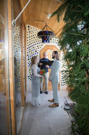 This wedding took place inside a Earthship which is a home off-the-grid