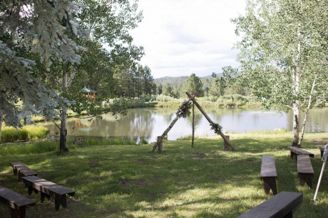 Gorgeous triangle altar with evergreen and aspens and a pond in Taos Canyon