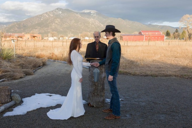 Taos mountain overlooks this December elopement at SpiriTaos