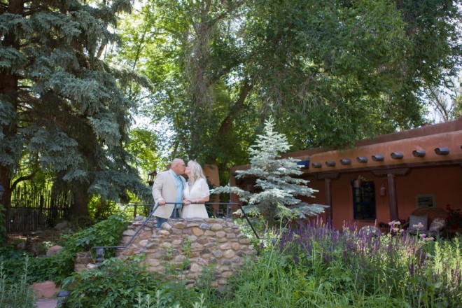 Michelle and Jeff celebrate their anniversary with a kiss at Adobe and Pines Inn