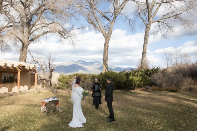 Taos, NM winter wedding with mountain views at local bed and breakfast.