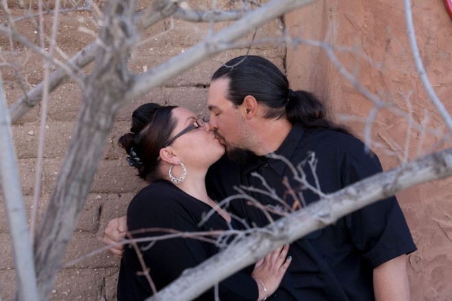Engagement pictures in wintertime with adobe and stucco