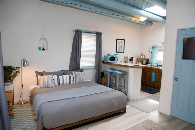 Taos, NM studio apartment with blue viga ceilings and blue accents