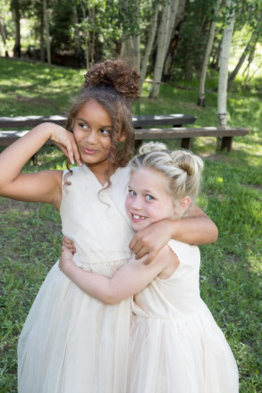 The flowergirls with their hair done, anxiously await the wedding