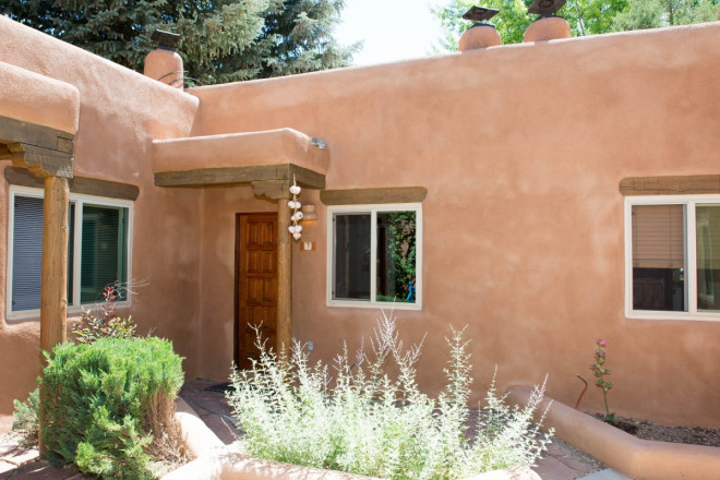 Outdoor view of pueblo style Taos condo unit near plaza