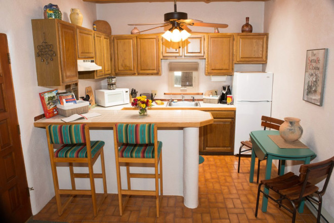 Breakfast bar and kitchen in small Taos NM condo