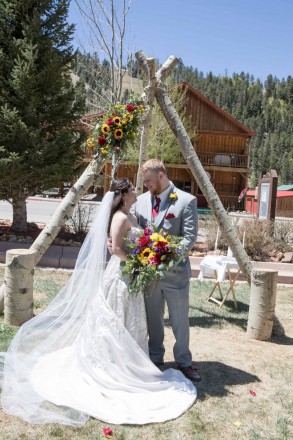 Ashleigh and Jordan were married under the blue skies of Red River, NM
