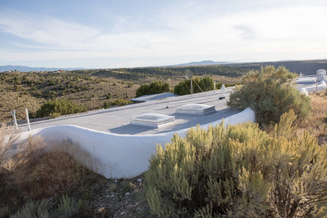 Real estate photos of Taos Earthship with view of 3 peaks in Taos, NM