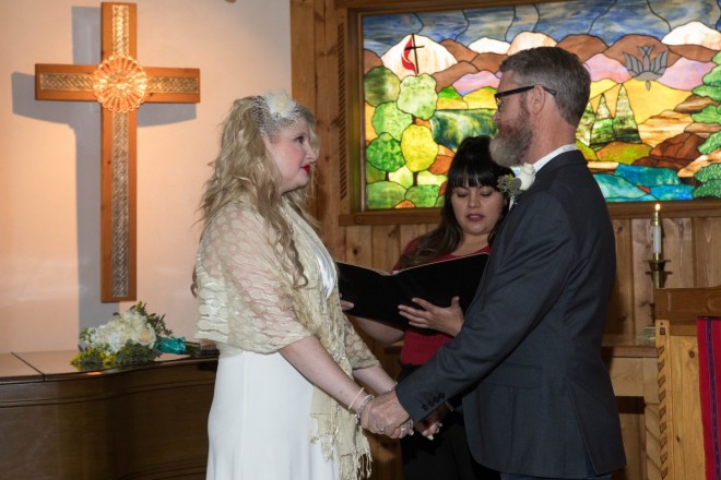 Manndi and Justin are married at Methodist Church on a snowy winter evening