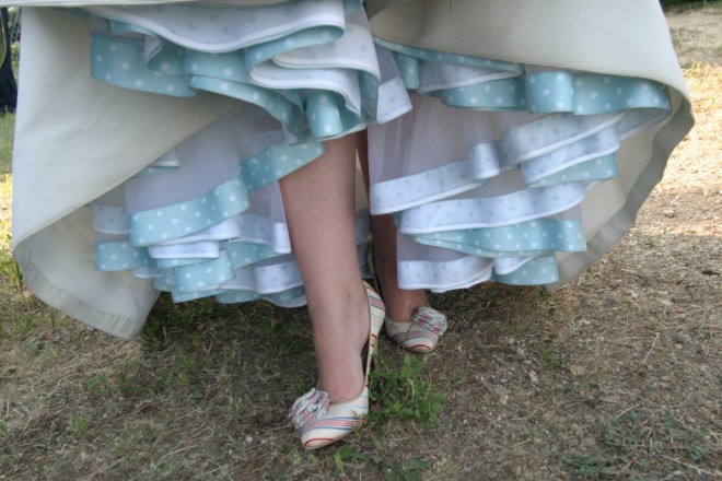 A bride with striped shoes and polka dot