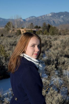 Bryna Kelley has her winter senior session photographed in Taos, NM.