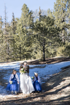 Lovely bride Amberly walks down "the aisle" with her daughters during the processional