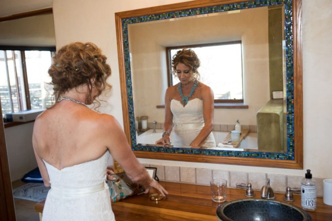 Chasity prepares for her wedding ceremony after her hair and makeup are complete
