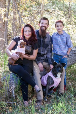 Taos local family pictures with mom, dad, son, and two dog-daughters