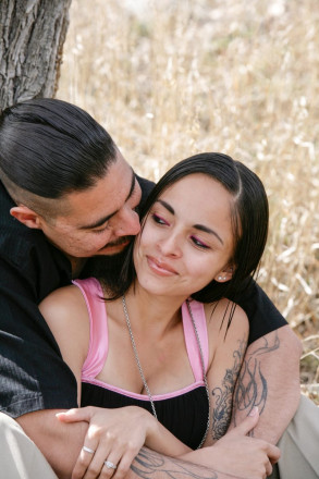 Engagement photos during a family photo shoot