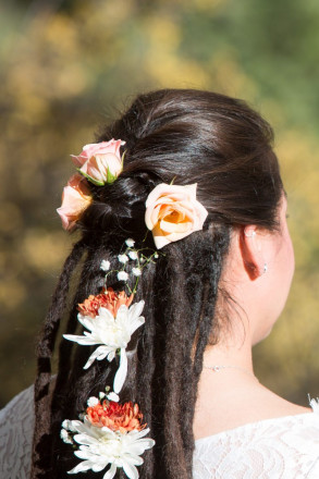 Sarah's beautiful dreadlocks were adorned with flowers