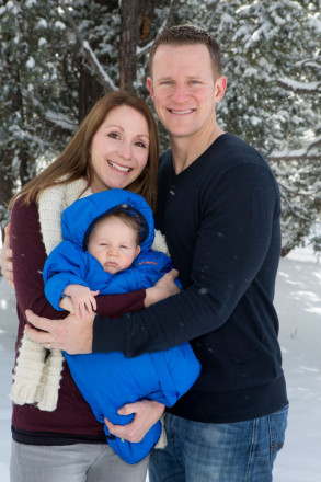 Angel Fire winter family photos outside in the snow with baby