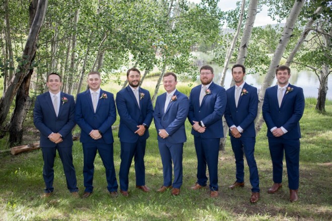Clynt stands with his groomsmen in the aspens of Valle Escondido