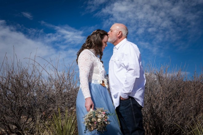 Taos, New Mexico where the skies area gorgeous wedding backdrop