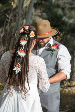 Sarah and Edwardo held hands as the officiant read a poem by E. E. Cummings