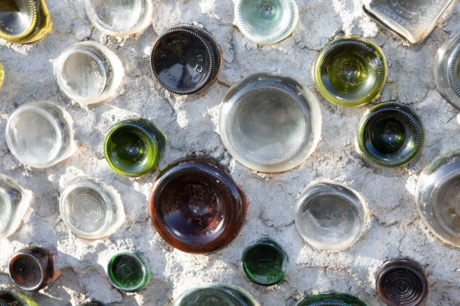 Glass bottles make up this exterior wall at Earthship in Taos County