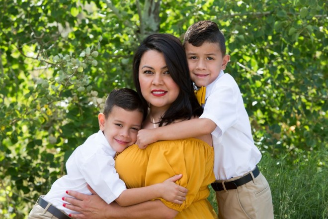 Local Taos mother with her children during family photo session with aspen trees